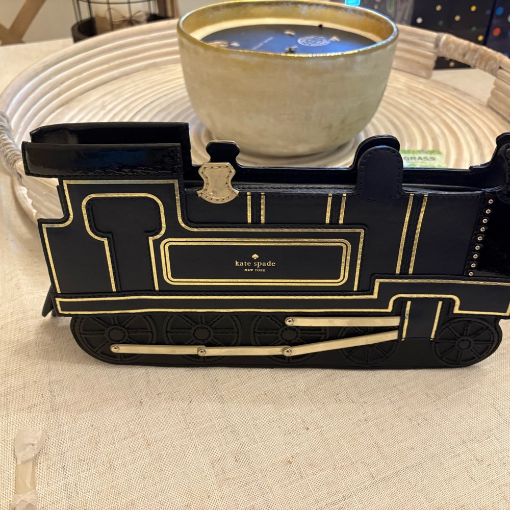 Kate Spade Black and Gold Train Clutch